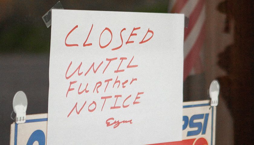 "Closed until further notice" sign