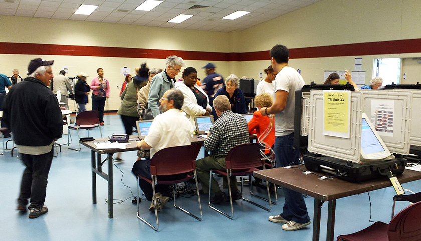 People at a voting location, voting early at polls