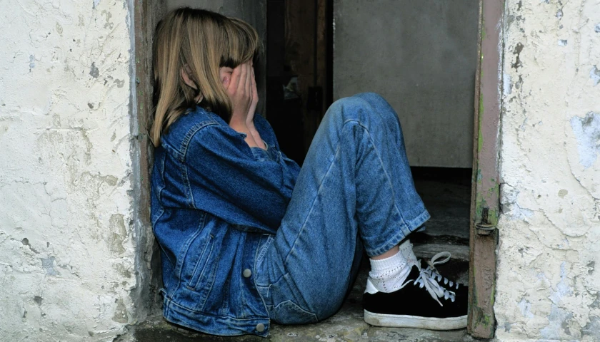 Girl Sitting Alone